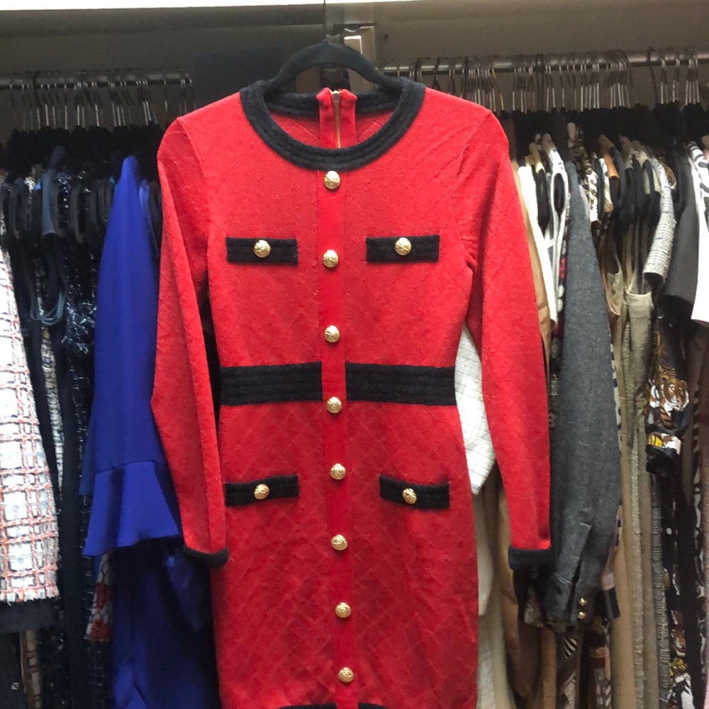 Show stopping red and black sweater dress